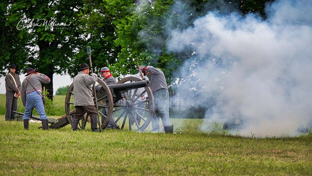 Artillery crew in smoke