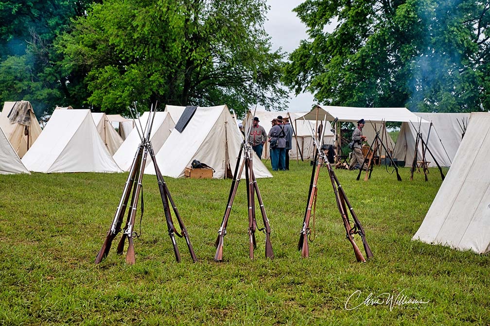 Rifles stacked in camp
